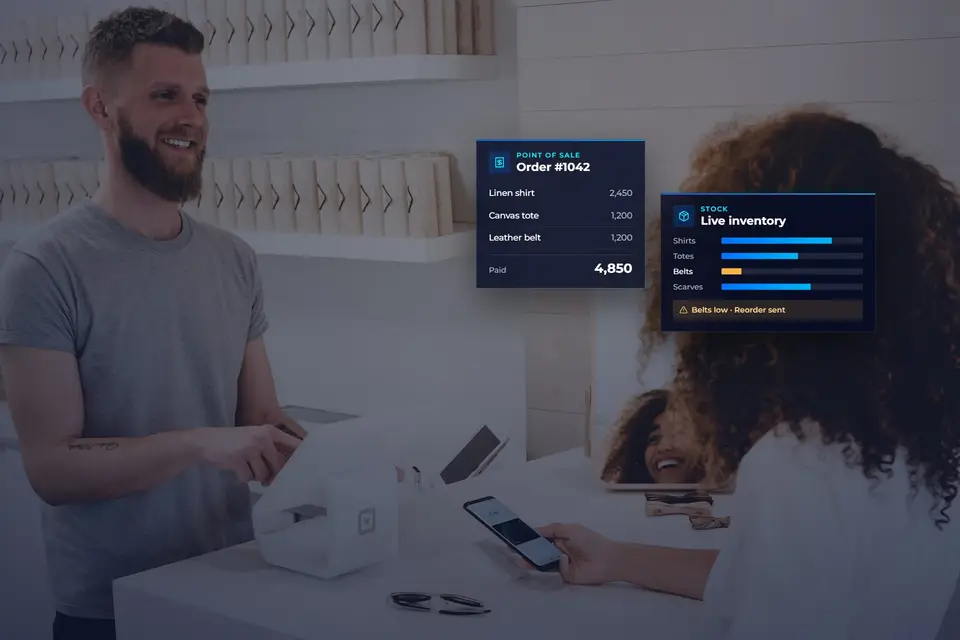 Store counter with a point-of-sale order and live stock levels showing a reorder alert